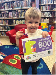 Youngsters reach reading milestones thanks to library