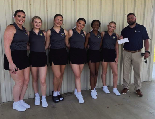 BOM Bank supports the Florien High School Varsity Cheerleaders! Pictured are Abby Kennedy, Emmalynne Lee, Vivi Graves, Kaylee Chreene, Paig Handy, Brylee Nichols, and BOM’s Lance Rivers.