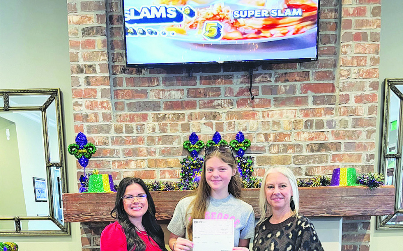 BOM Bank is a proud sponsor of the Many High School Softball Program, helping with travel, equipment, and game-day expenses. Pictured left to right: BOM’s Ashley Parrie, Teagan Rodrigues, and BOM’s Tiffany Miller.
