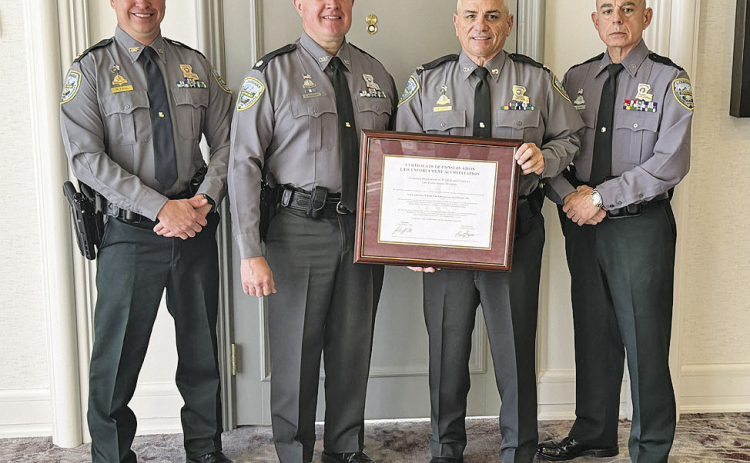 The LDWF Enforcement Division recently became the third law enforcement agency to earn the North American Wildlife Law Enforcement Accreditation. Pictured from left are Capt. Ryan Faul, Lt. Col. Clay Marques, Col. Stephen Clark, and Lt. Col. Eddie Skena.