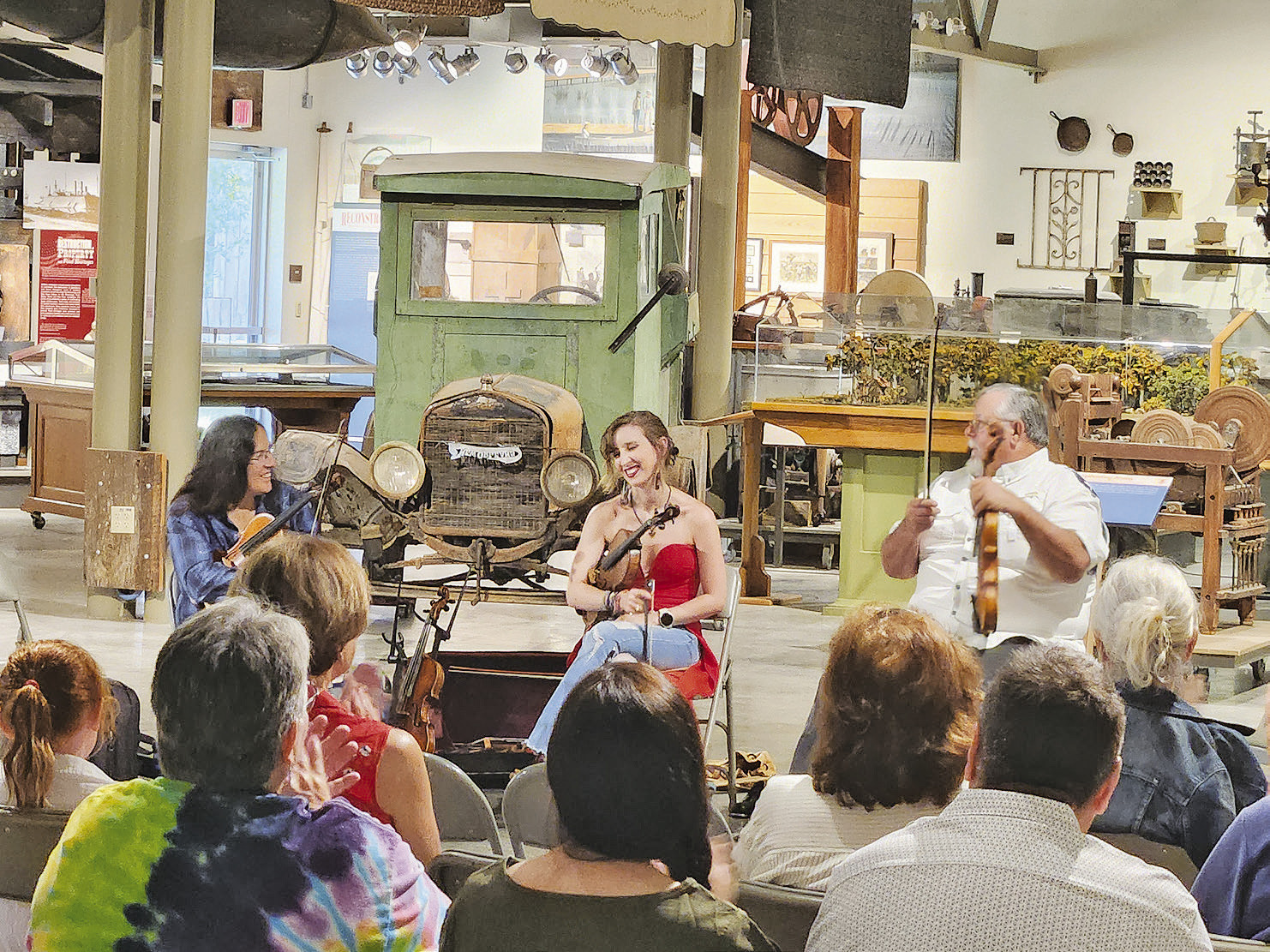 Fiddlers, from left, Gina Forsyth, Clancey Stewart and Joe Suchanek at the “Fiddlin’ with the Finest! A Celebration of Louisiana Folk Fiddling” program held Saturday at the LSU Rural Life Museum in Baton Rouge. The program was sponsored by the Louisiana Folklife Center at Northwestern State University to promote the annual Louisiana State Fiddle Championship which will be held in Natchitoches on July 18. Photo by Christina Brown.