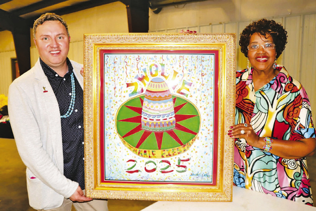 Dr. Cody Bruce and poster artist Mrs. Dorothy Sweet Calhoun holding the original watercolor poster.