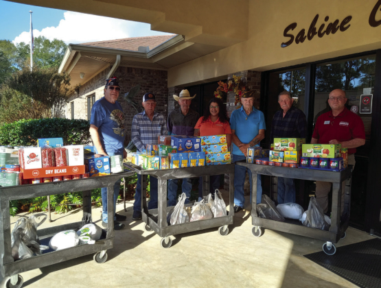 Zwolle-Ebarb VFW Post 5187 recently donated canned goods, non-perishable foods, and meats to the Sabine Council on Aging’s Food Pantry. Pictured from left are Walt Korb, Danny Lopez, Johnnie Springer, Jessica Procell, Jim Frith, Virgil Ezernack, and Jeff Morrow. Donations to the pantry are an annual project of the post.