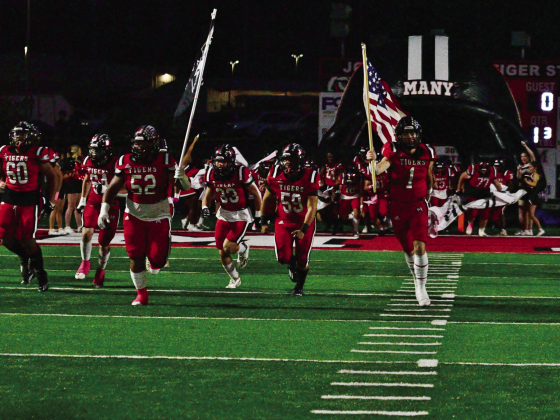 Many Tigers defeat Red River Bulldogs 52-18