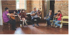 Participants in the Louisiana Folklife Center program “Fiddlin’ with the Finest! A Celebration of Louisiana Folk Fiddling” on Saturday at the Many Depot Museum in Many included, from left, Joe Suchanek, Clancey Stewart, Ron Yule, Samuel O’Kelley and Sarah O’Kelley.