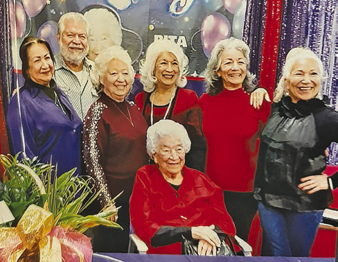 Rita McComic celebrates