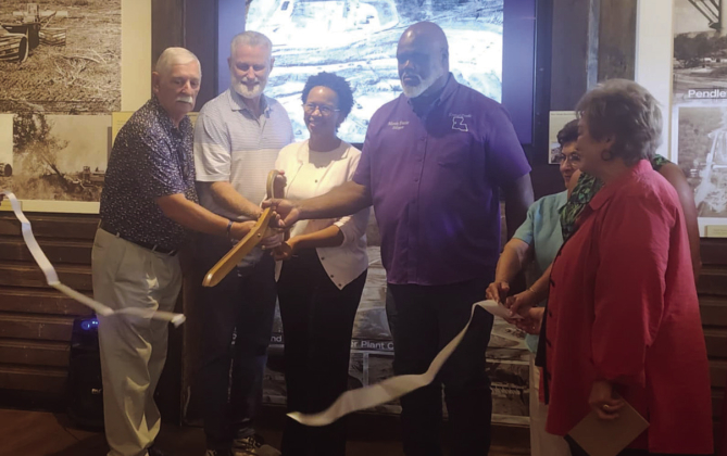 Hundreds were in attendance at the historic train depot on July 18 as the ribbon was cut on the Zwolle Museum on the Bend. Among those shown cutting the ribbon are Town Councilwoman Martha Henderson, Linda Curtis- Sparks, Executive Director of the Sabine Parish Tourist Commission Georgia Craven, and Zwolle Mayor Marvin Frazier.