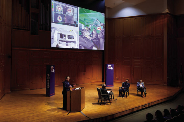 Dr. Julian Bailes, left, discussed how AI technology will transform medicine and healthcare at the “Leadership in the Age of AI” forum at NSU March 19. Seated are Dr. Greg Handel, moderator, and panelists Dr. Neilank Jha and Monty Chicola.