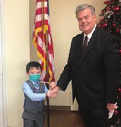“Mayor” Axel McCullough visits with Many Mayor Freeman