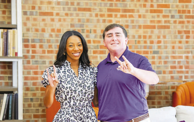 Lauryn Vernon, left, and Owen Stutzman pose in Northwestern State University’s new Alumni Center.