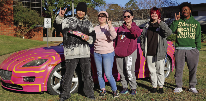Nelson Tamez is designer of the 2024 Mazda art car, which he and a team of students executed. From left are Tamez, Harlee Manry, Tatum VanderHey, Koda Shoemake and Cameron Murphy.