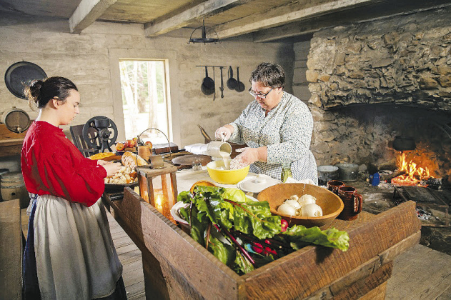 Demonstrating historical cooking techniques at the on-site kitchen at Ft. Jesup State Historic Site