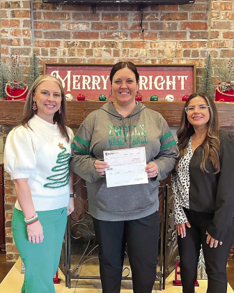 BOM was a sponsor of the Zwolle High School Annual Basketball Tournament. Pictured from left are BOM’s Tiffany Miller, Stephanie Leone, and BOM’s Ashley Parrie.