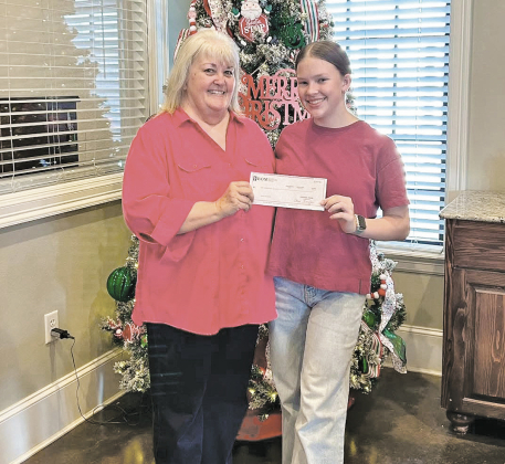 BOM was a sponsor of the Negreet High School Cross Country program. Pictured left to right: BOM’s Twyla Lovelady and Braylee Jo Veuleman.