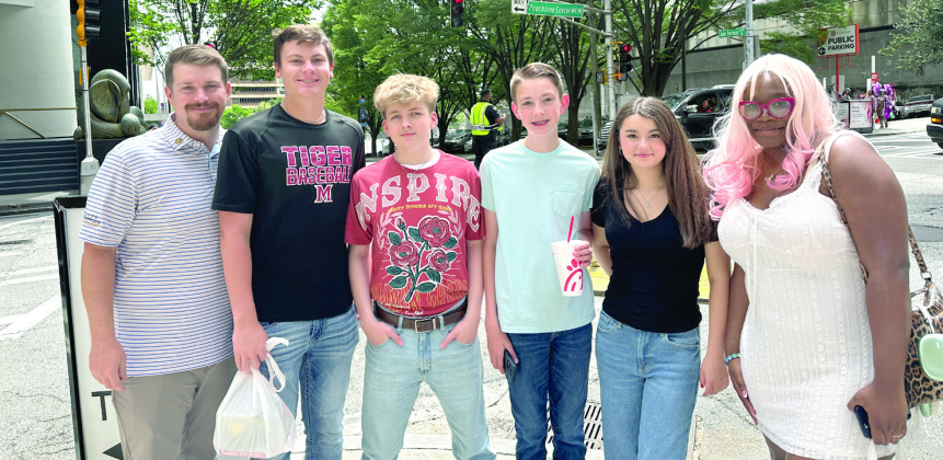 The Many High School Quiz Bowl team took a moment to pose for this picture during a break from their rigorous tournament schedule. Pictured from left are Coach Jacob Heard, Kaghan Miller, Jackson Hubley, William Mains, Adelyn Penfield, and Alison Loucious.