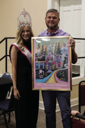 Blake Byles with Earthmovers Construction was one of poster winners. The unveiling and honoree reception was held on November 14 at the CDC building in Many,