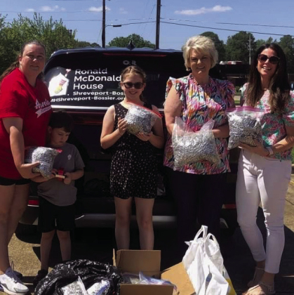 4-H Cloverbuds collecting pop tops