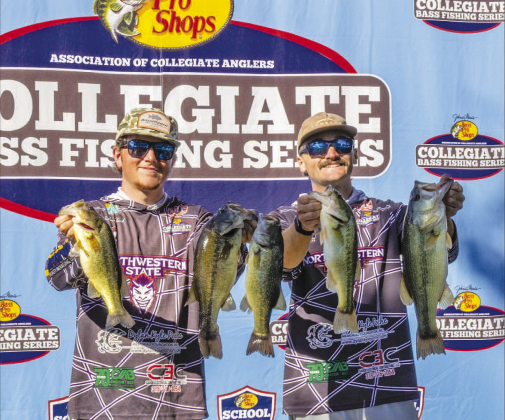Northwestern State University Fishing Team members Ayden Slack, left, and Daniel Gallagher display their catch at the AFTCO Collegiate Bass Open on Lake Dardanelle in Russellville, Arkansas.