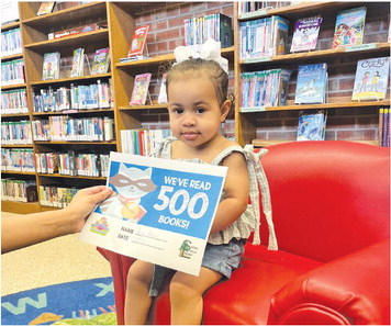 Local children reach reading milestones