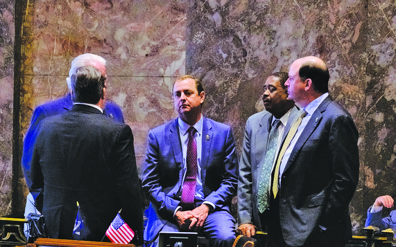 Sen. Patrick McMath, center, proposed an expansion in high-dosage tutoring to public school students in more grades, Cross Harris/LSU Manship School News Service