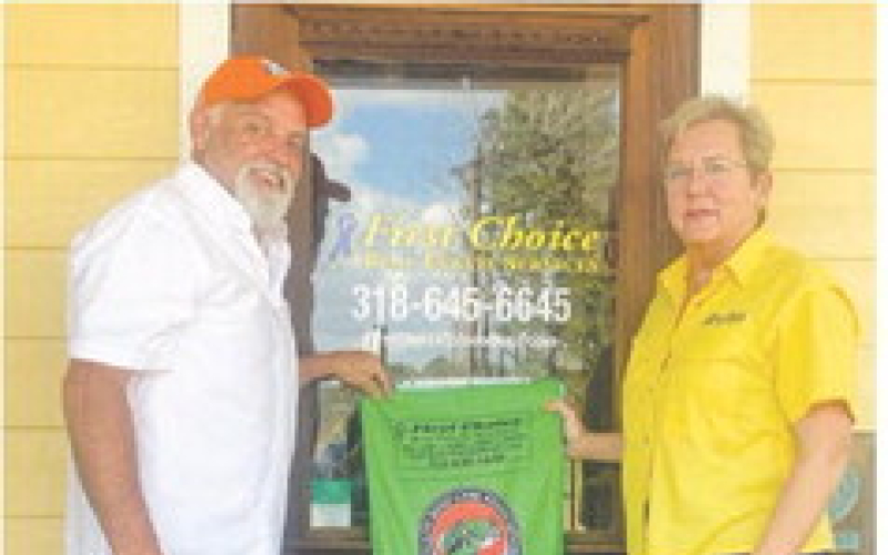 First Choice Real Estate Services is co-sponsor of the fish/golf towels for the Bass Unlimited Banquet. Pictured showing the towel are BU Chairman Tommy Phillips with Owner/Broker Dayna Yeldell.
