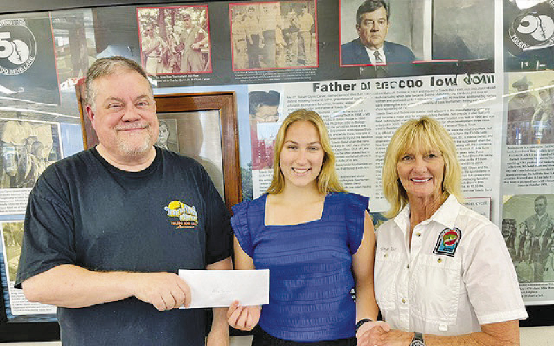 The Toledo Bend Lake Association awards the Glynn Carver Memorial Scholarship for $5,000 to Allie Tarver of Florien High School. Pictured from the left are Curt Carver, scholarship recipient Allie Tarver, and TBLA President Ginger Rice.
