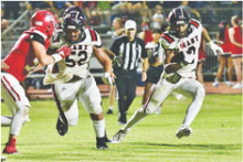 Many Tigers take down Haughton Buccaneers in double overtime
