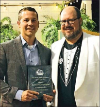 Chamber banquet draws crowd; honors achievers, costume winners