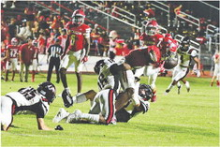 Many Tigers take down Haughton Buccaneers in double overtime