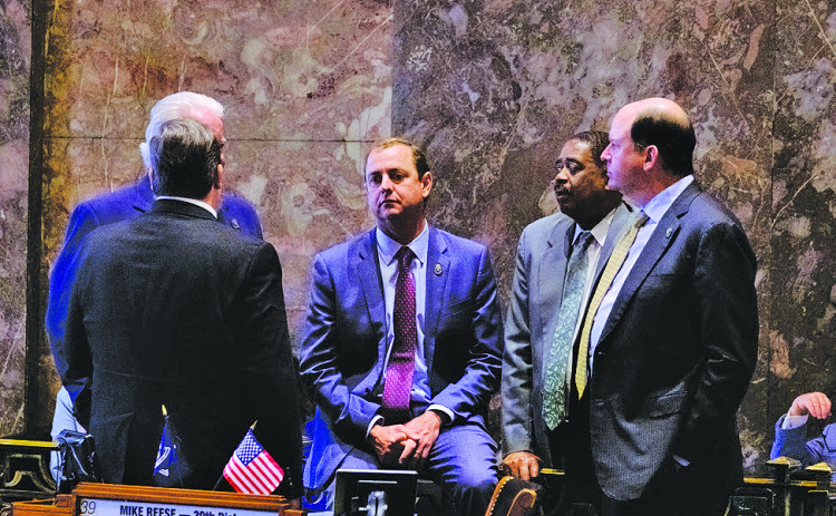 Sen. Patrick McMath, center, proposed an expansion in high-dosage tutoring to public school students in more grades, Cross Harris/LSU Manship School News Service