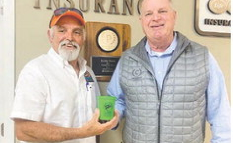 State Farm Insurance Agent Buddy Wood is the proud sponsor for the drink cups of the Bass Unlimited Banquet. Pictured are Buddy Wood, Owner and BU Chairman Tommy Phillips.